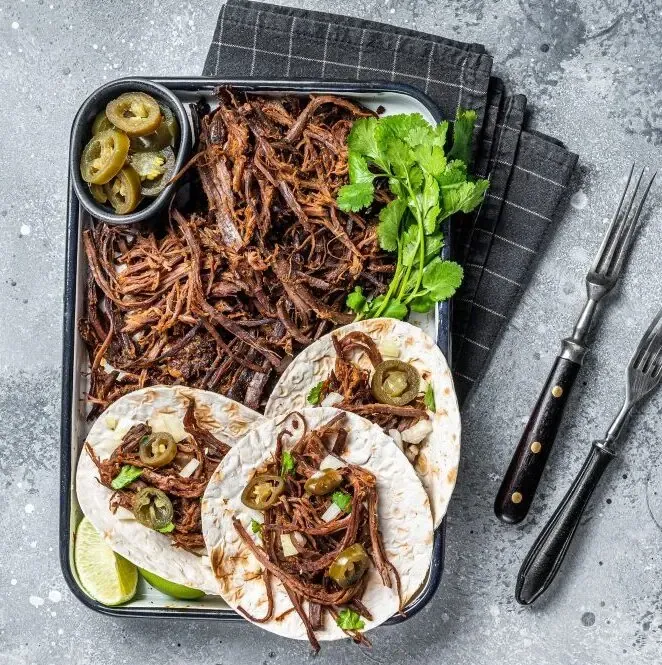 Tacos de barbacoa de borrego